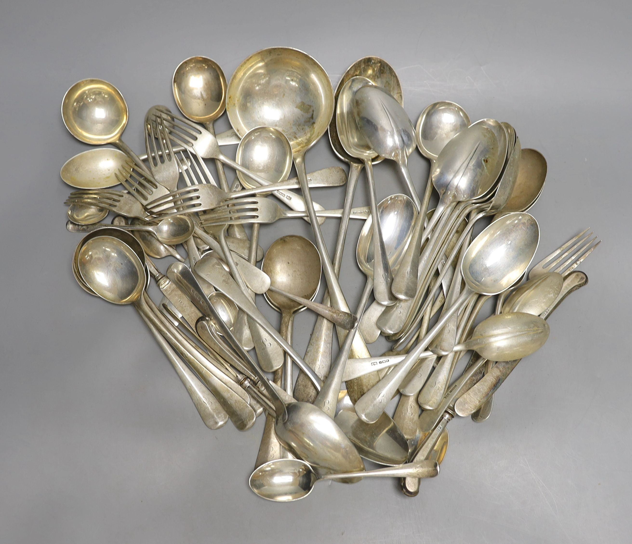 A part canteen of George V silver Hanovarian rat tail flatware, comprising forty nine items, Mappin & Webb, Sheffield, 1912, two other Georgian silver table spoons and five silver handled tea knives